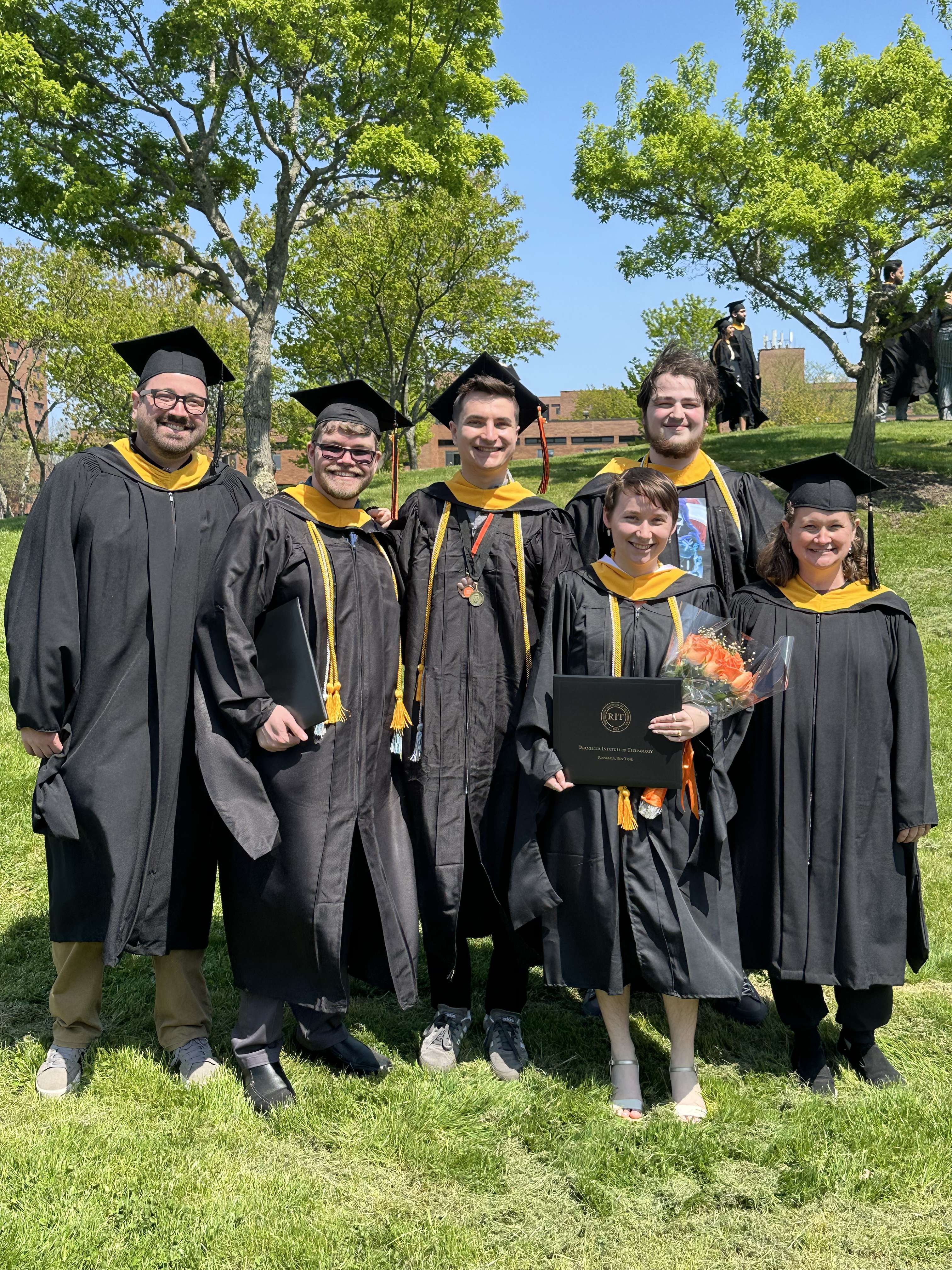 Prof. Snyder, Kevin Insinna, Sam Burgoyne, Carrie Wilson, Lucas Corey, and Prof. Mesh after the 2025 GCCIS Commencement ceremony